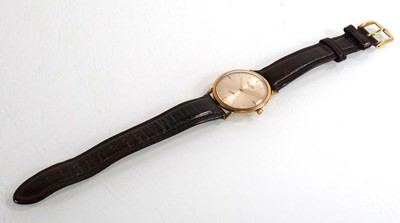 Lot 409 - A gentleman's 9ct yellow gold wristwatch by...