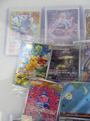 Lot Qty of Top Loaded Pokémon Cards to include...