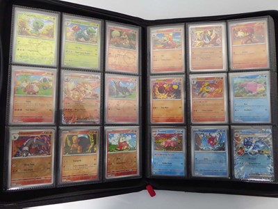 Lot x2 Binders containing an assortment of Pokemon...