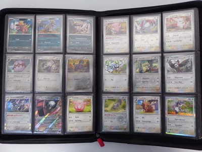 Lot x2 Binders containing an assortment of Pokemon...