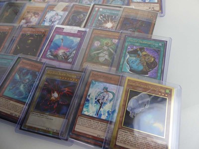 Lot Qty of Top Loaded Yu-Gi-Oh Trading Cards to...