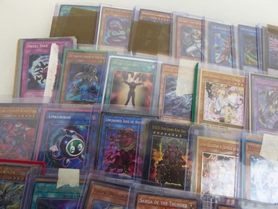 Lot Qty of Top Loaded Yu-Gi-Oh Trading Cards to...