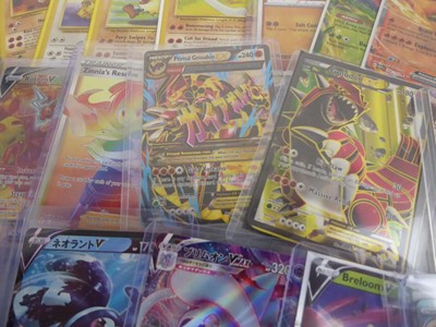 Lot Qty of Top Loaded Pokemon Cards to include...