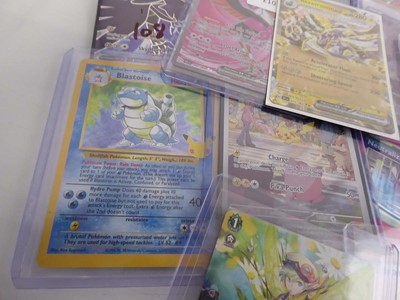 Lot Qty of Top Loaded Pokemon Cards to include...