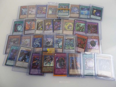 Lot Qty of Top Loaded Yu-Gi-Oh Cards to include...