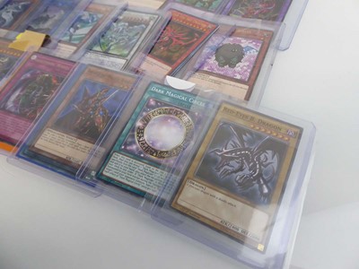 Lot Qty of Top Loaded Yu-Gi-Oh Cards to include...