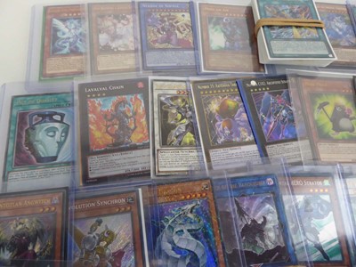 Lot Qty of Top Loaded Yu-Gi-Oh Cards to include...