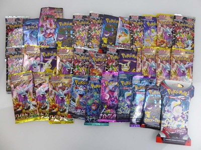 Lot Approx 34 English/Japanese Pokemon Booster...