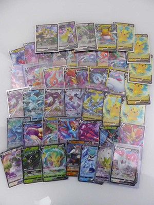 Lot Qty of Top Loaded Pokémon Cards to include x6...