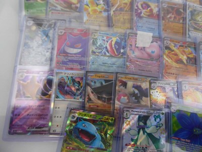 Lot Qty of Top Loaded EX/V/VMAX Pokémon Cards to...