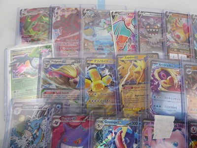 Lot Qty of Top Loaded EX/V/VMAX Pokémon Cards to...