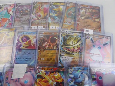 Lot Qty of Top Loaded EX/V/VMAX Pokémon Cards to...