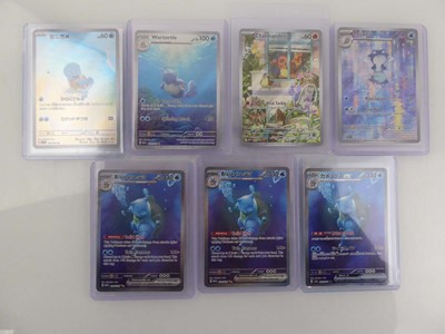 Lot Qty of Top Loaded Pokémon Cards to include...