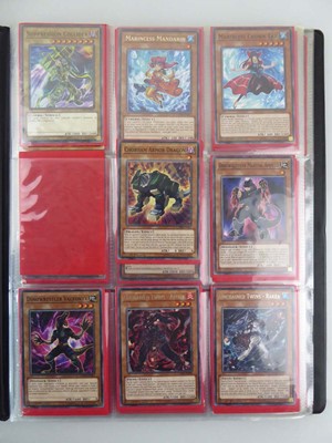 Lot Binder containing an assortment of Yu-Gi-Oh cards