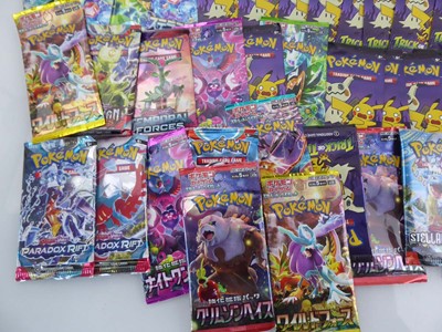 Lot Approx. 84 Pokémon English/Japanese Booster...