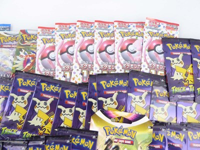 Lot Approx. 84 Pokémon English/Japanese Booster...