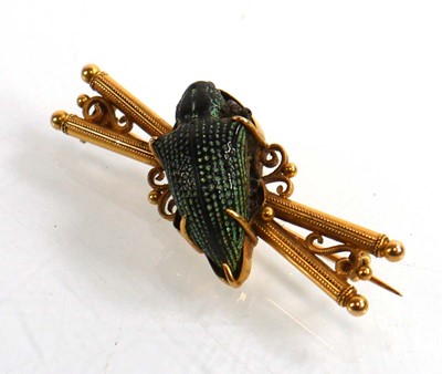 Lot 912 - An early 20th century yellow metal brooch...