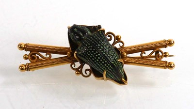 Lot 912 - An early 20th century yellow metal brooch...