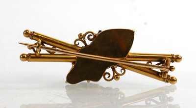 Lot 912 - An early 20th century yellow metal brooch...