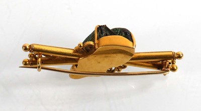 Lot 912 - An early 20th century yellow metal brooch...