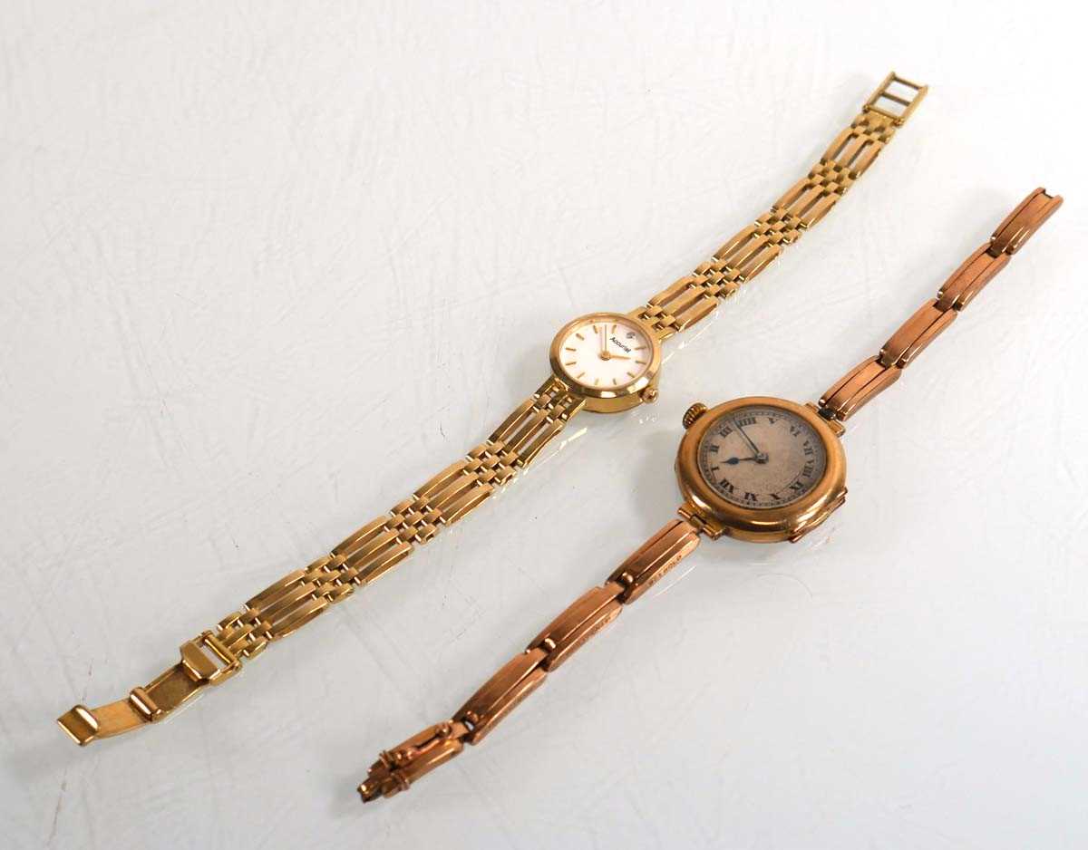 Lot 433 - A ladies 9ct yellow gold wristwatch by...