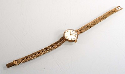 Lot 434 - A ladies 9ct yellow gold wristwatch by Omega,...