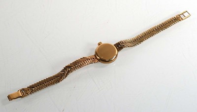 Lot 434 - A ladies 9ct yellow gold wristwatch by Omega,...