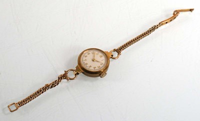 Lot 442 - A ladies 9ct yellow gold wristwatch, the...