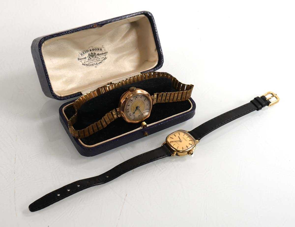 Lot 443 - A ladies 9ct yellow gold wristwatch by Tissot,...