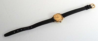 Lot 443 - A ladies 9ct yellow gold wristwatch by Tissot,...