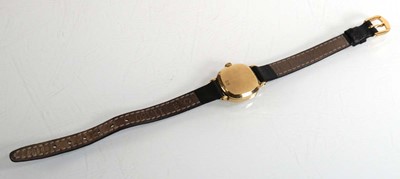 Lot 443 - A ladies 9ct yellow gold wristwatch by Tissot,...