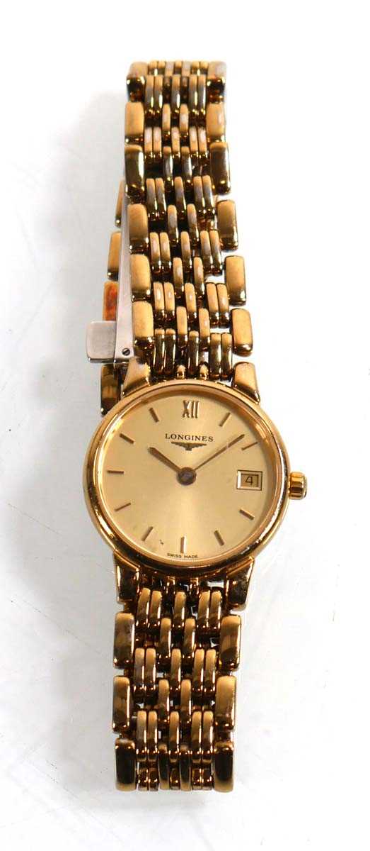 Lot 445 - A ladies gold plated wristwatch by Longines,...