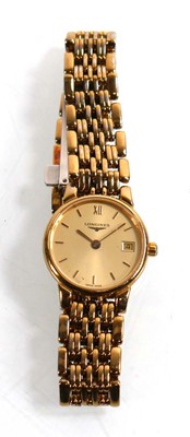 Lot A ladies gold plated wristwatch by Longines,...