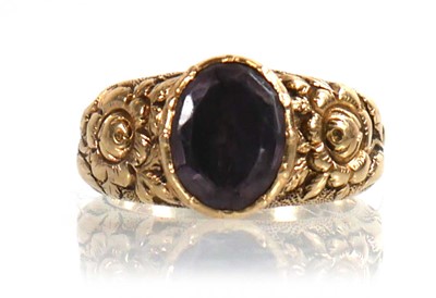 Lot 916 - A yellow metal mourning ring set oval pale...