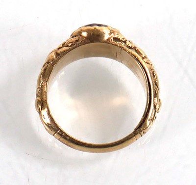 Lot 916 - A yellow metal mourning ring set oval pale...