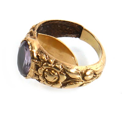 Lot 916 - A yellow metal mourning ring set oval pale...