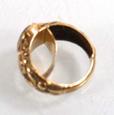 Lot 916 - A yellow metal mourning ring set oval pale...