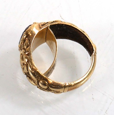 Lot 916 - A yellow metal mourning ring set oval pale...