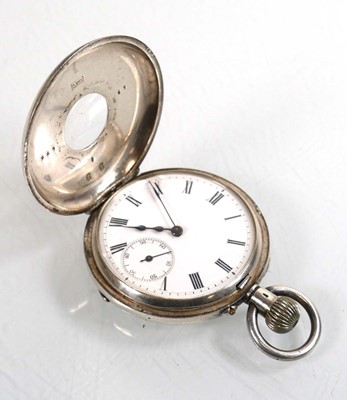 Lot 478 - A silver half hunter pocket watch, the white...