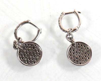 Lot 920 - A pair of white metal ear pendants, each set...