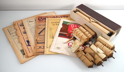 Lot 73 - A group of mechanical musical rolls, a cased...