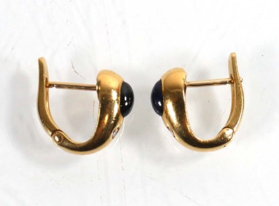 Lot 921 - A pair of 18ct yellow gold ear hoops, each set...