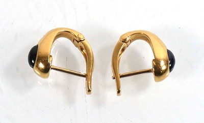 Lot 921 - A pair of 18ct yellow gold ear hoops, each set...