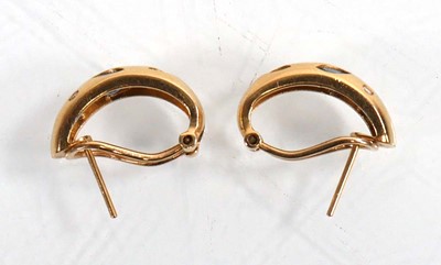 Lot 922 - A pair of 14ct yellow gold ear hoops, each set...