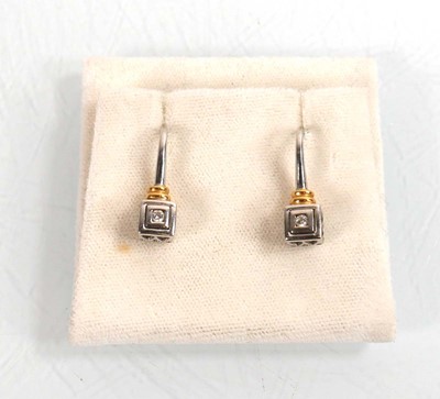 Lot 923 - A pair of 18ct white and yellow gold...