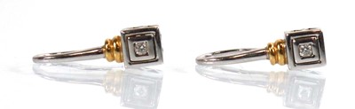 Lot 923 - A pair of 18ct white and yellow gold...