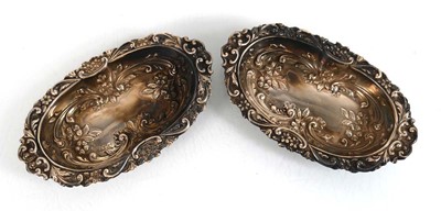 Lot 203 - A pair of Edwardian silver dishes of oval form...