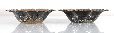 Lot 204 - A pair of late Victorian stamped silver dishes...