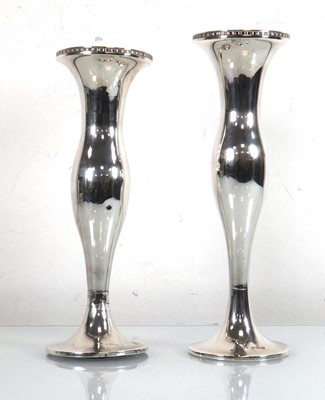 Lot 210 - A pair of Edwardian silver spill vases of...