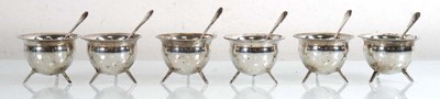 Lot 217 - A set of six Edwardian silver salts, each on...